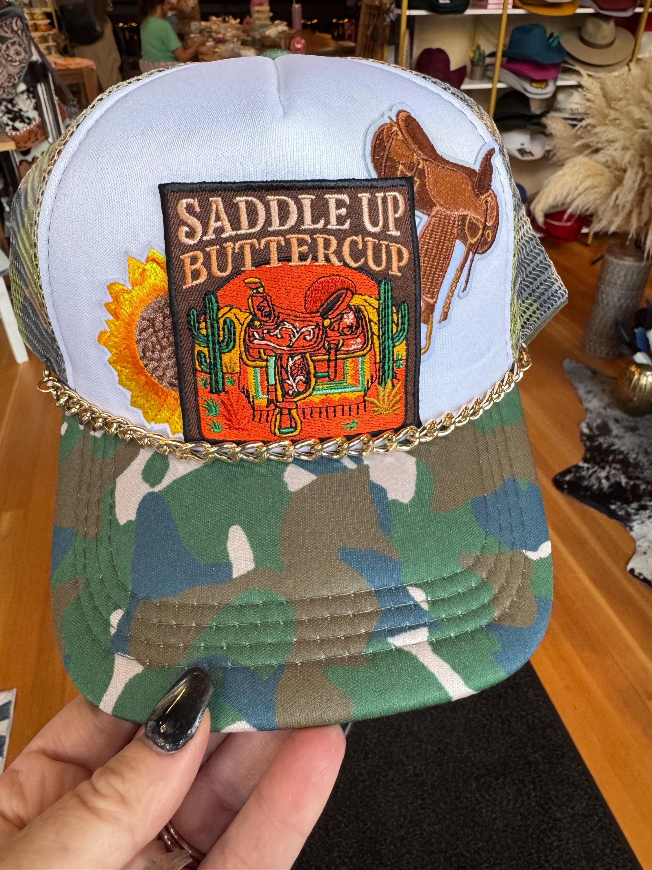 Saddle Up Buttercup Trucker Hat – Western Patch Camo Snapback with Chain Detail
