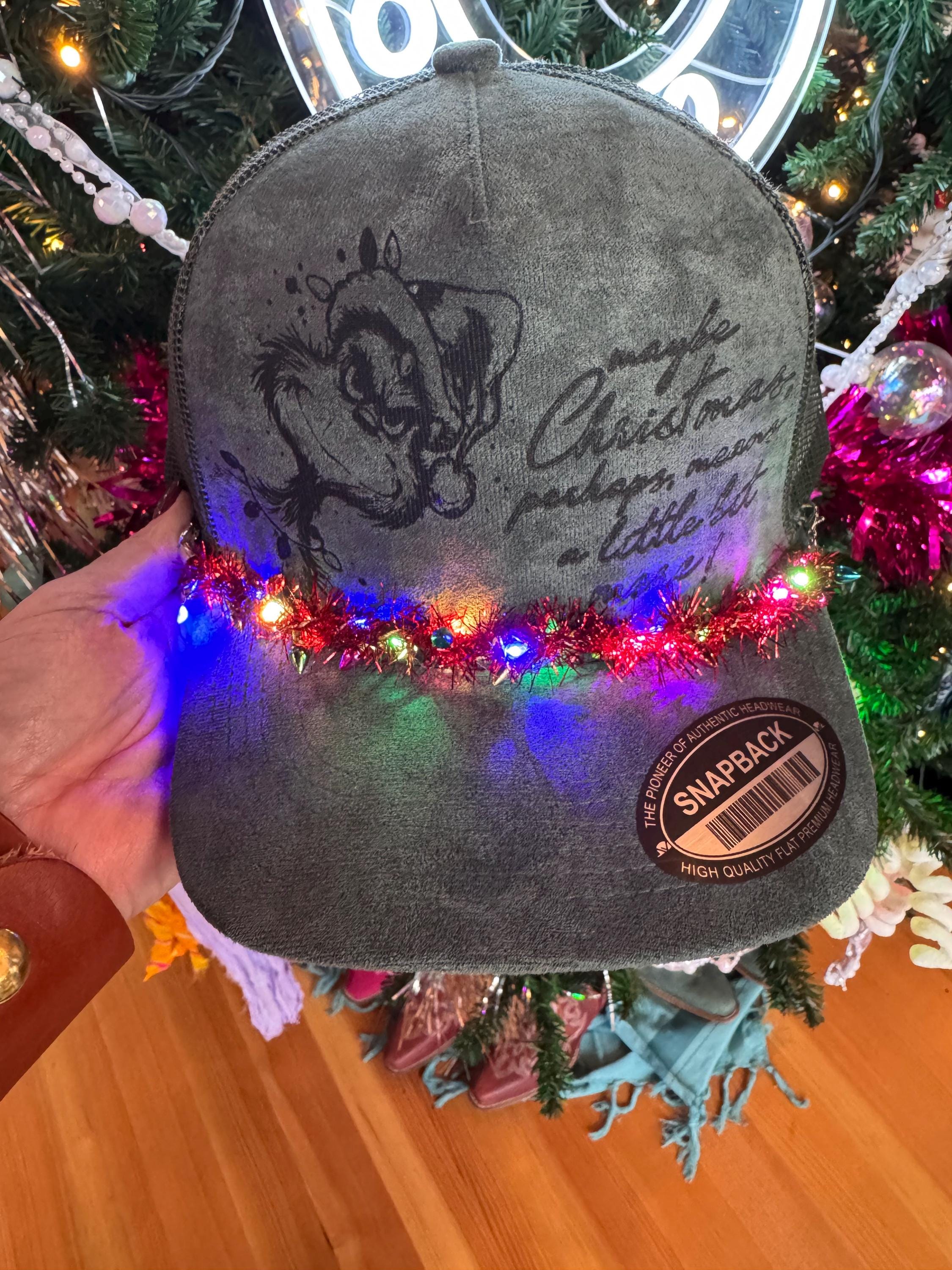 Green Suede “Maybe Christmas” Trucker Hat with Light-Up Garland Chain